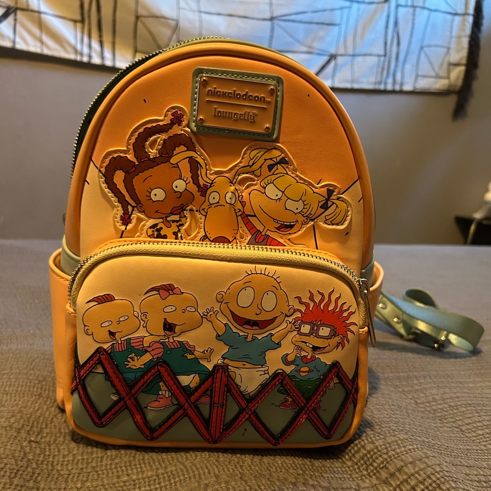 Nickelodeon 30th anniversary Loungefly backpack  and matching wallet.